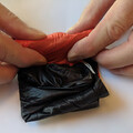 Demonstration of rolling the folded canopy of a drone parachute