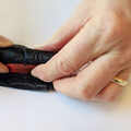 Demonstration of rolling the folded canopy of a drone parachute