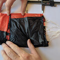 Demonstration of sectioning a drone parachute canopy for proper folding