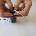 Demonstration of packing a drone parachute into the launcher canister