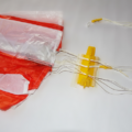 Parachute with the shroud lines set in a parachute folding and rigging jig