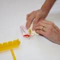 Demonstration of folding the canopy of a parachute using a parachute folding and rigging jig