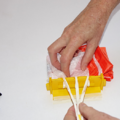 Demonstration of folding the canopy of a parachute using a parachute folding and rigging jig