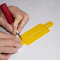 Demonstration of preparing the base of a parachute folding and rigging jig