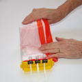 Demonstration of folding the canopy of a parachute using a parachute folding and rigging jig