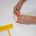 Demonstration of folding the canopy of a parachute using a parachute folding and rigging jig
