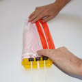 Demonstration of folding the canopy of a parachute using a parachute folding and rigging jig