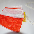 Parachute with the shroud lines set in a parachute folding and rigging jig
