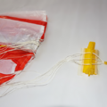 Parachute with the shroud lines set in a parachute folding and rigging jig