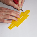 Demonstration of preparing the base of a parachute folding and rigging jig
