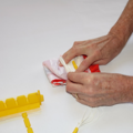 Demonstration of folding the canopy of a parachute using a parachute folding and rigging jig