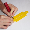 Demonstration of preparing the base of a parachute folding and rigging jig