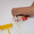 Demonstration of folding the canopy of a parachute using a parachute folding and rigging jig
