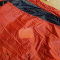Patched parachute canopy