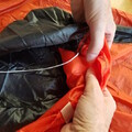 Demonstration of checking the underside of a damaged parachute canopy