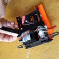 Demonstration of removing Velcro from a drone parachute flip board