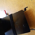Closeup of Velcro strap securing flip plate on carbon fiber mount plate