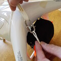 Demonstration of securing a drone parachute shock cord and harnesses on a drone airframe