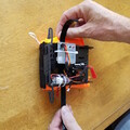 Demonstration of removing Velcro from a drone parachute flip board