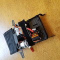 Velcro strap securing flip plate on carbon fiber mount plate