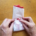 Demonstration of folding the canopy of a drone parachute