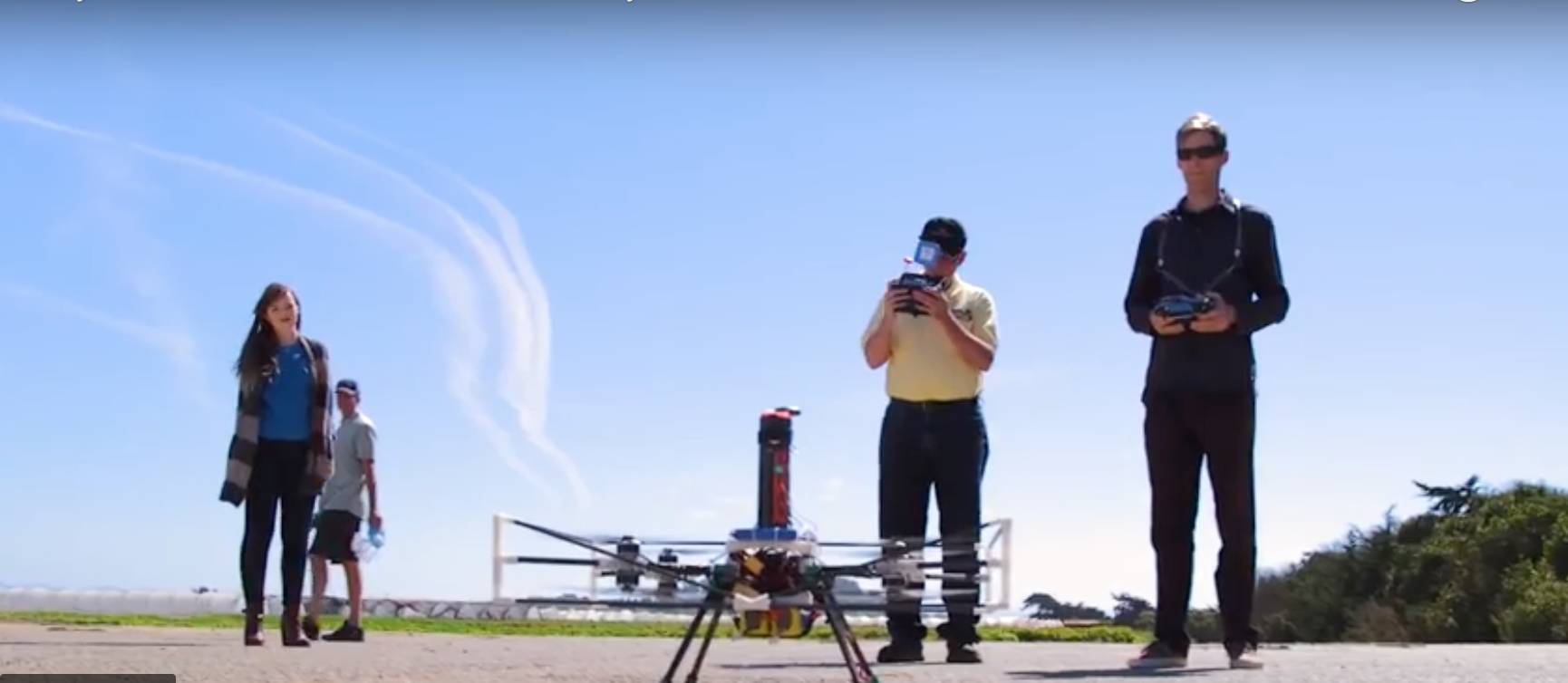 Fruity Chutes team and drone with parachute in testing field