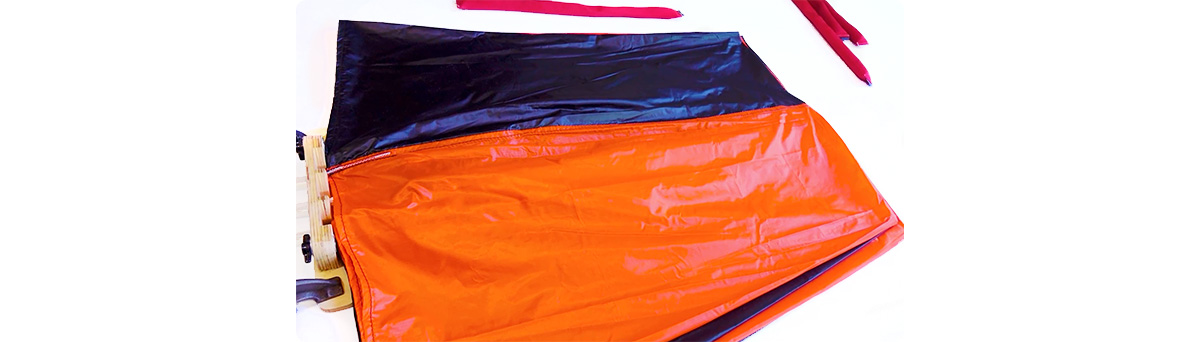 Parachute canopy organized into six layers of flacked gores on each side