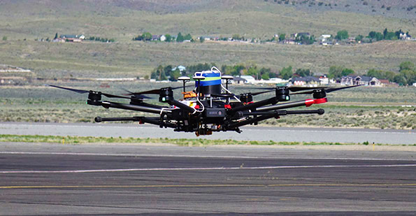 Drone in flight Peregrine UAV ballistic recovery system installed at NIAS