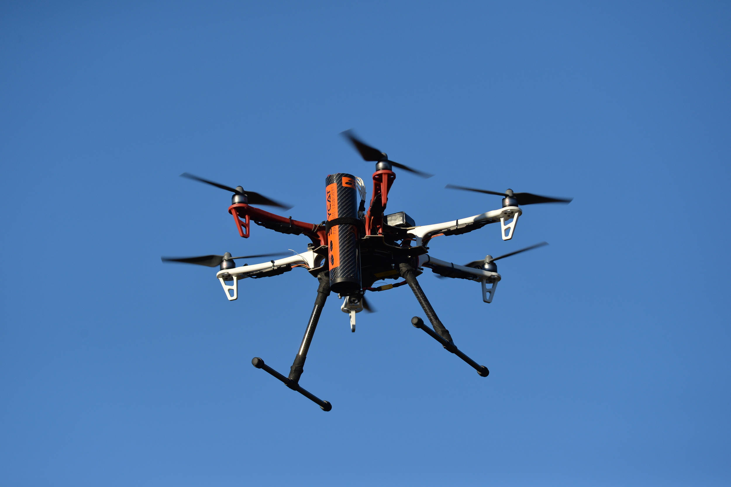 Drone with Skycat UAV parachute launcher mounted to the side